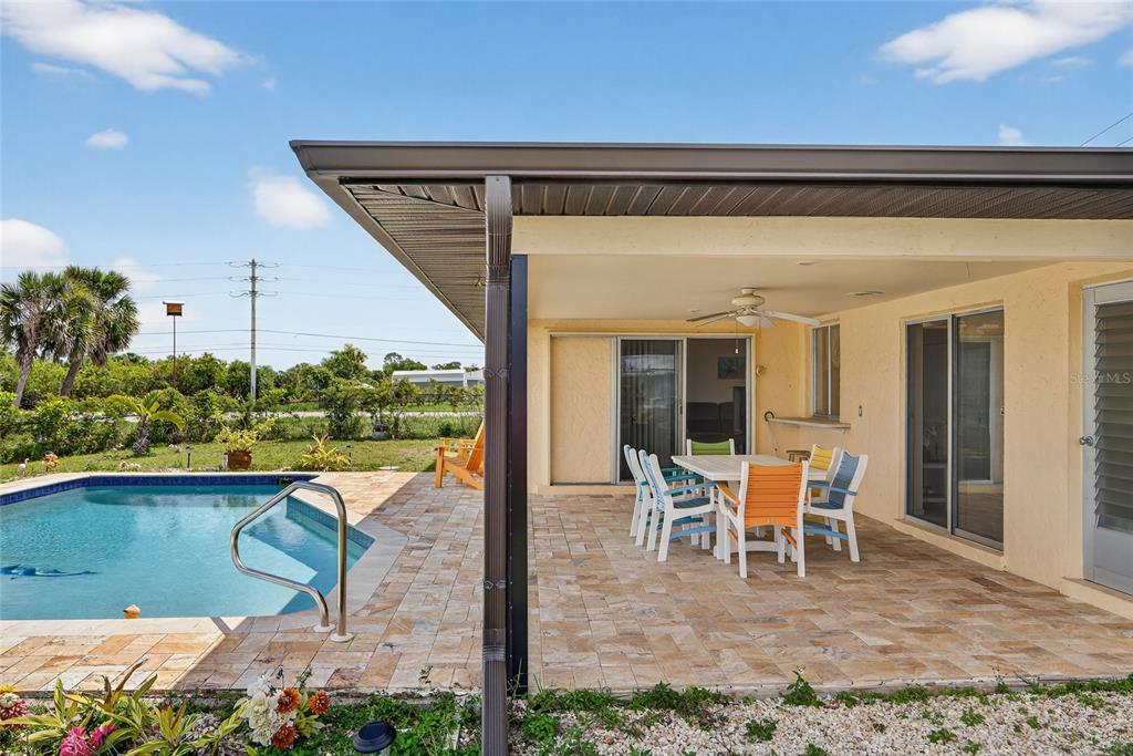 2484 Broad Ranch Drive Port Charlotte, FL 33948 - Photo 25 of 43 a view of a chairs and table in the patio