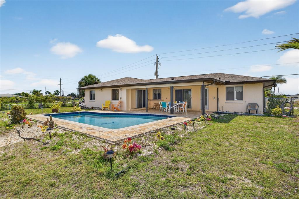 2484 Broad Ranch Drive Port Charlotte, FL 33948 - Photo 28 of 43 a very nice looking house with a large pool and a yard