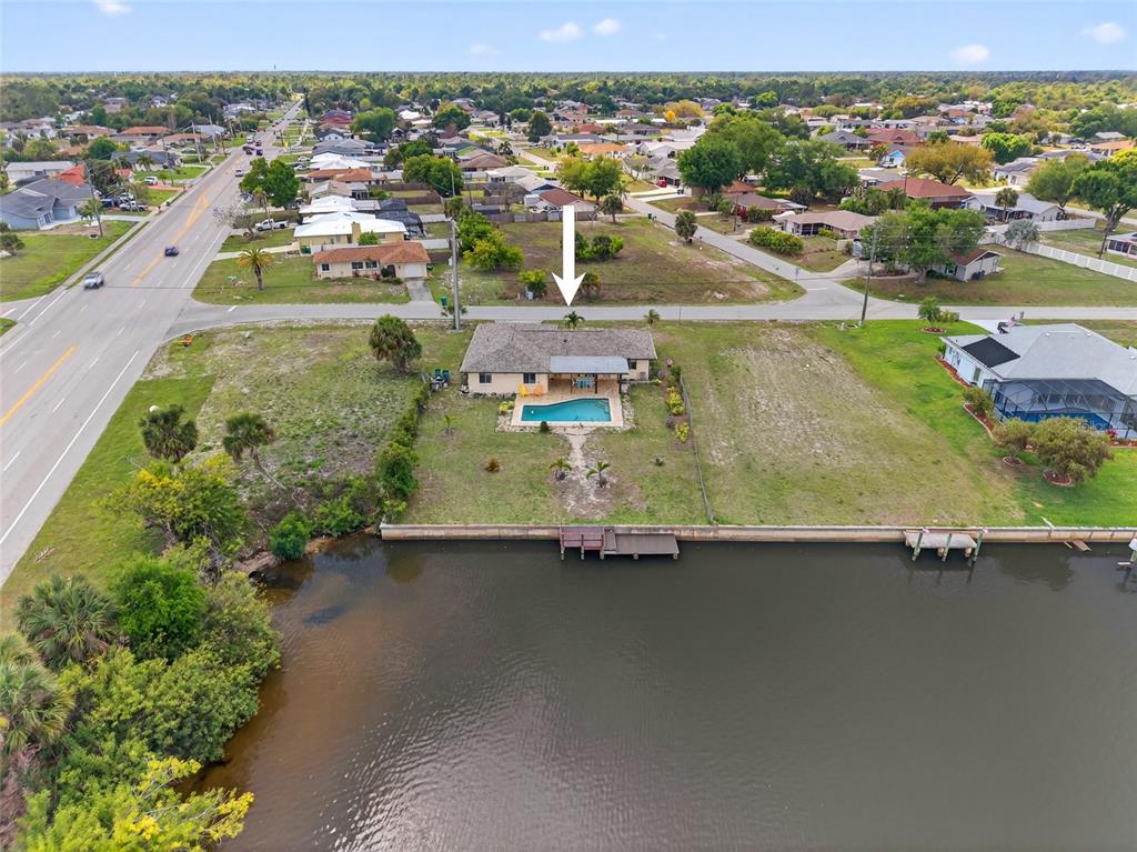2484 Broad Ranch Drive Port Charlotte, FL 33948 - Photo 35 of 43 an aerial view of a city with a lake view