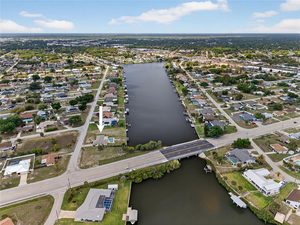 2484 Broad Ranch Drive Port Charlotte, FL 33948 - Photo 40 of 43 an aerial view of residential houses with outdoor space