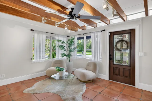 a outdoor living space with patio furniture and a potted plant