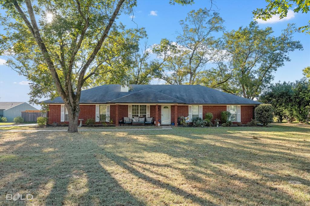 3804 Farmridge Road Keithville, LA 71047 - Photo 2 of 36 a view of a house with a yard