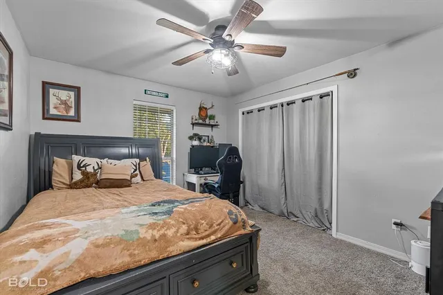a spacious bathroom with a sink a mirror and shower