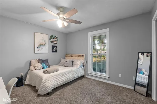a room that has a bed and a closet