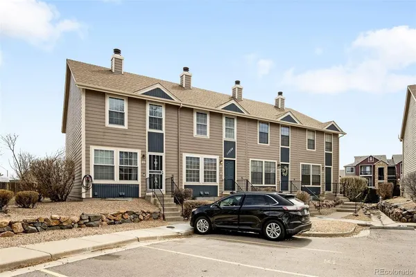 a car parked in front of a house