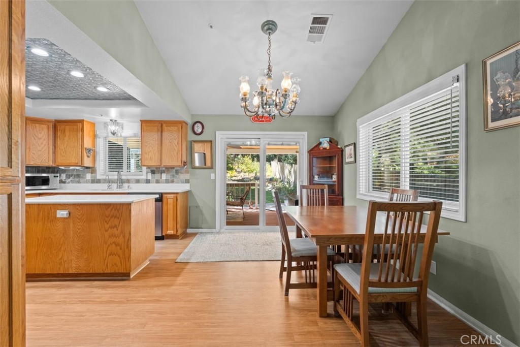 1585 Linnet Road Wrightwood, CA 92397 - Photo 11 of 38 a view of a dining room with furniture window and outside view