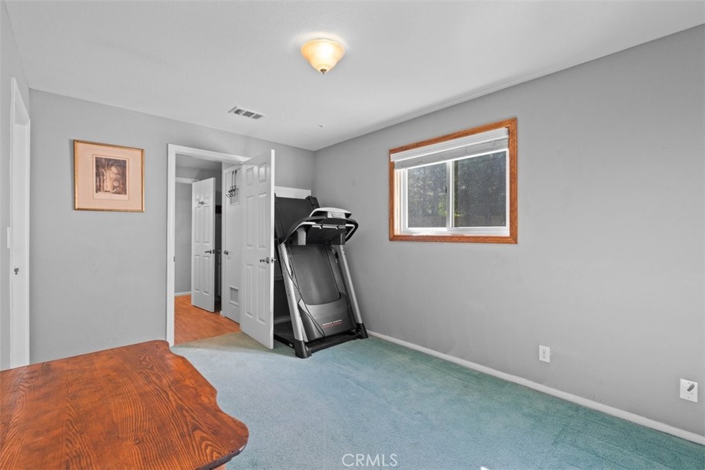 1585 Linnet Road Wrightwood, CA 92397 - Photo 18 of 38 a view of a room with gym equipment