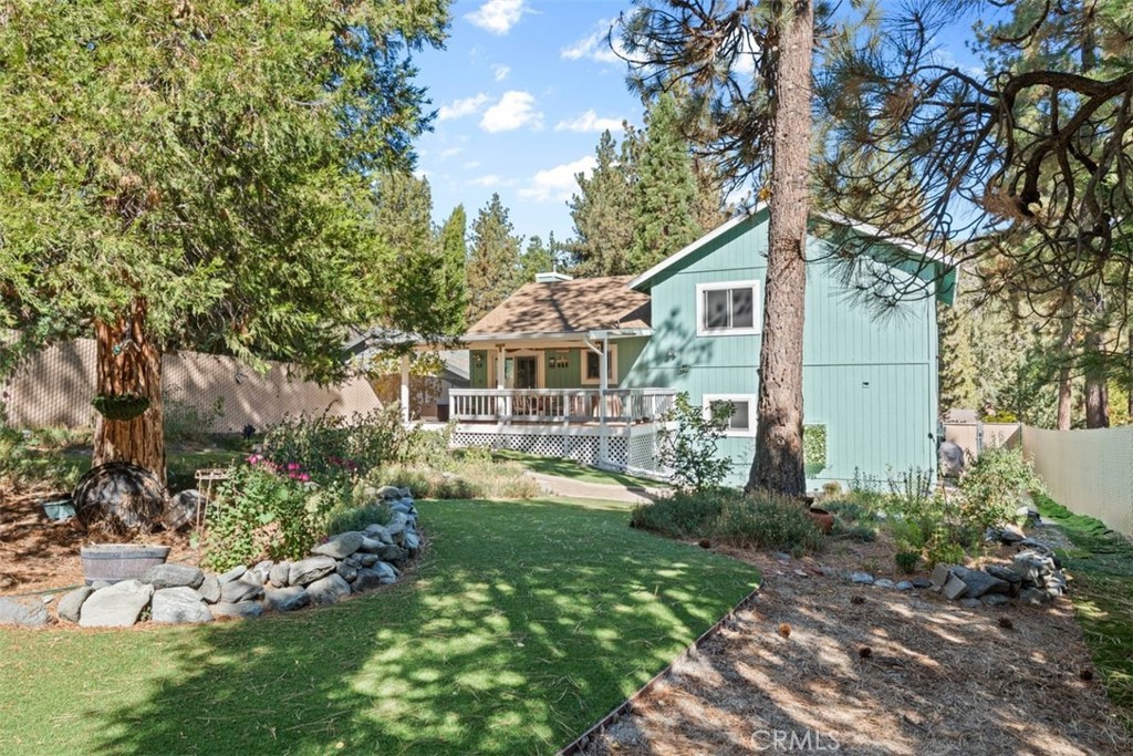 1585 Linnet Road Wrightwood, CA 92397 - Photo 2 of 38 a front view of a house with a yard
