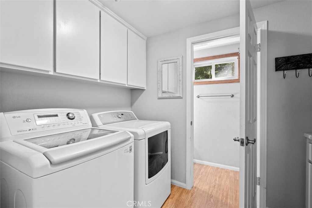 1585 Linnet Road Wrightwood, CA 92397 - Photo 27 of 38 a view of storage and utility room with washer and dryer
