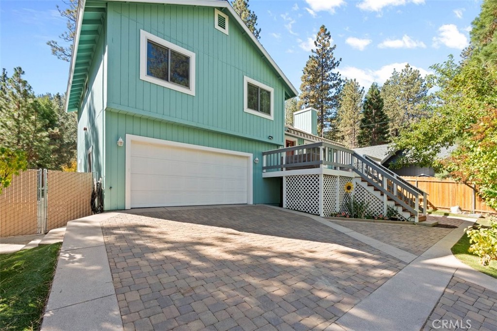 1585 Linnet Road Wrightwood, CA 92397 - Photo 7 of 38 a front view of a house with a yard