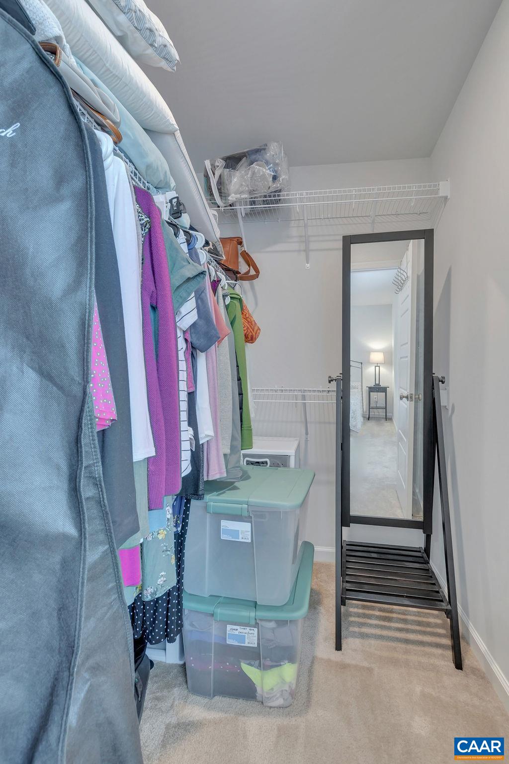 2176 Avinity Loop Charlottesville, VA 22902 - Photo 24 of 50 a view of walk in closet with clothes and shoes