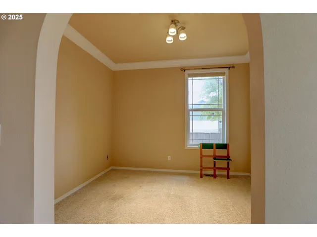 a view of a room with a hallway