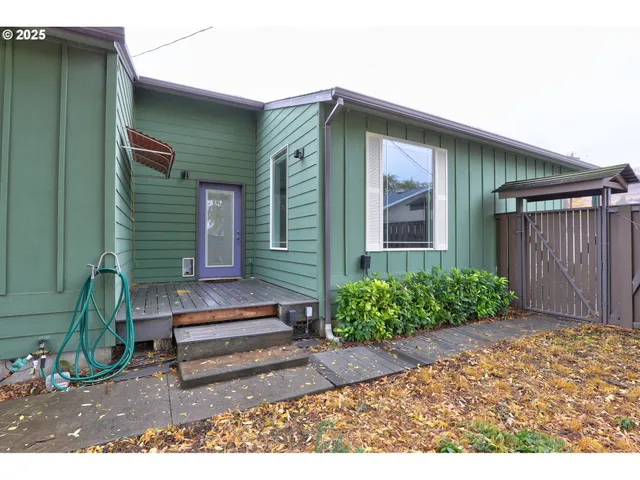a backyard of a house with a garden