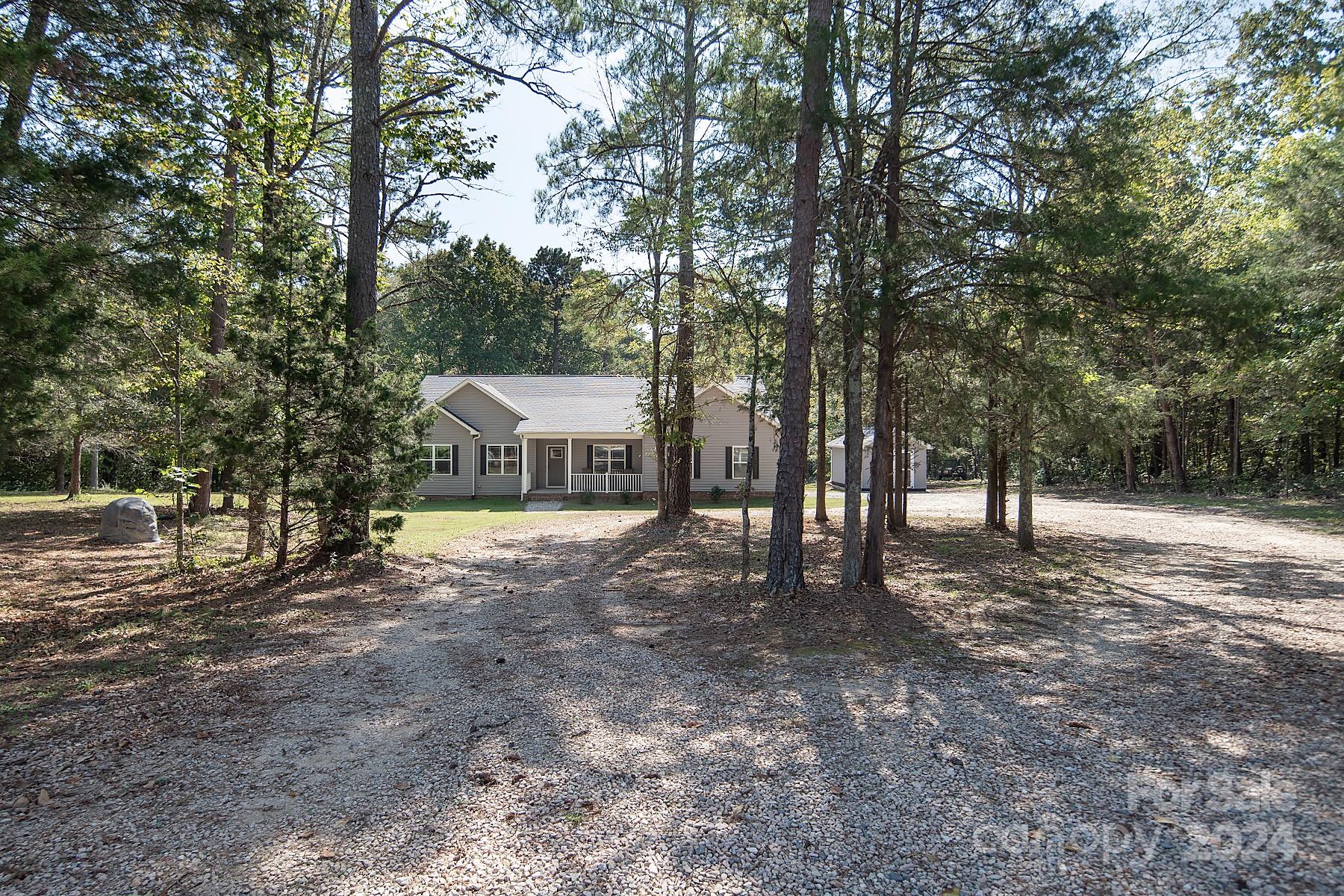 3000 Penninger Road Concord, NC 28025 - Photo 1 of 48 a view of a large trees with lots of trees
