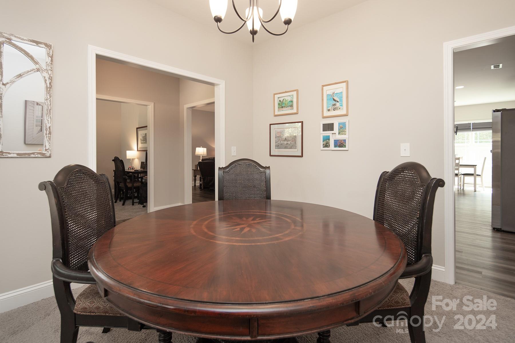 3000 Penninger Road Concord, NC 28025 - Photo 11 of 48 a dining room with furniture and window