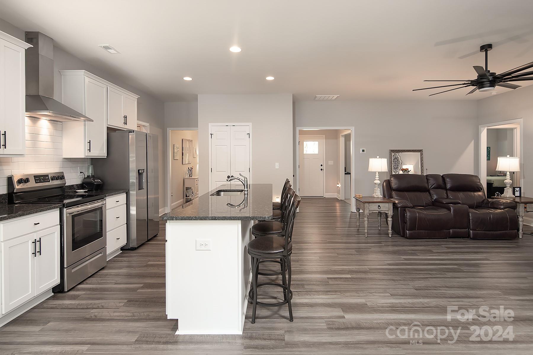3000 Penninger Road Concord, NC 28025 - Photo 20 of 48 a kitchen with counter top space cabinets and stainless steel appliances
