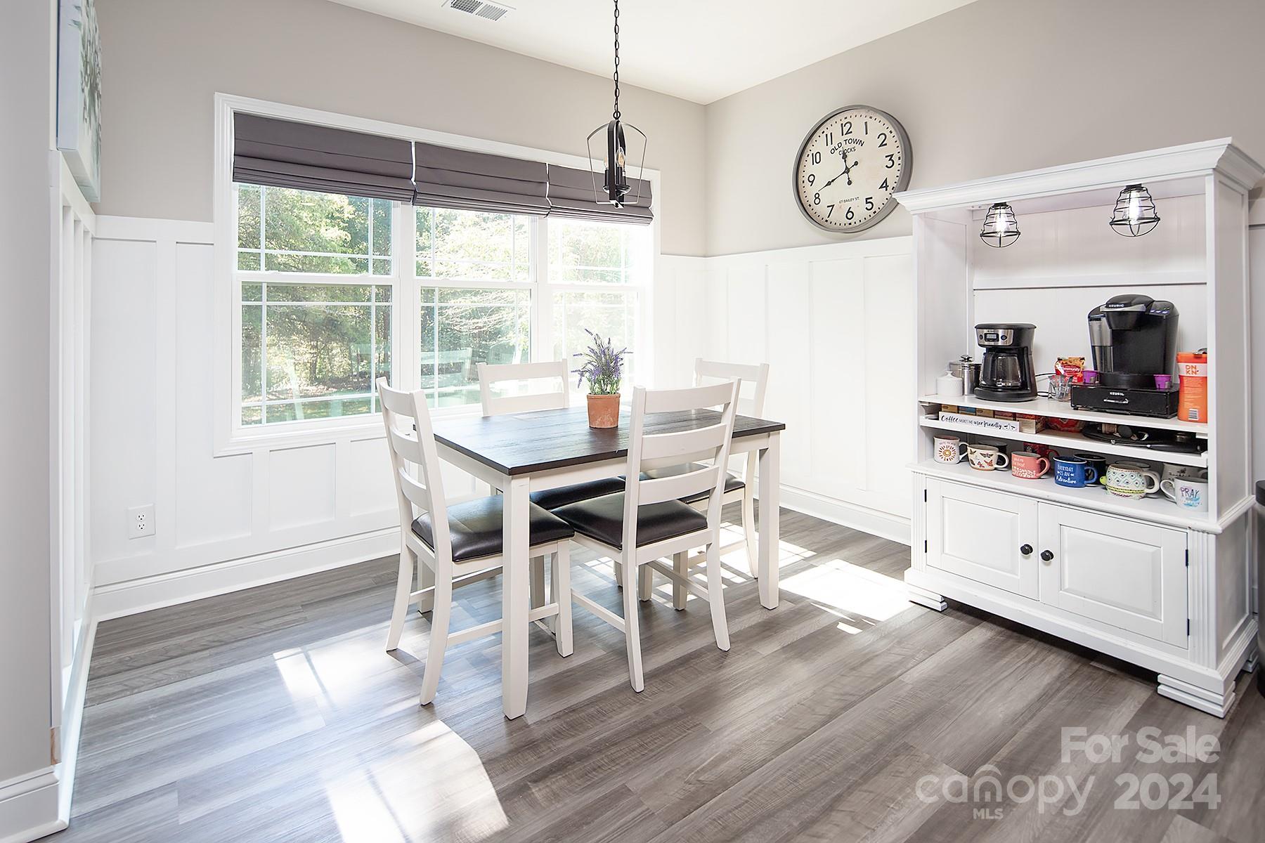 3000 Penninger Road Concord, NC 28025 - Photo 21 of 48 a view of a dining room with furniture window and wooden floor
