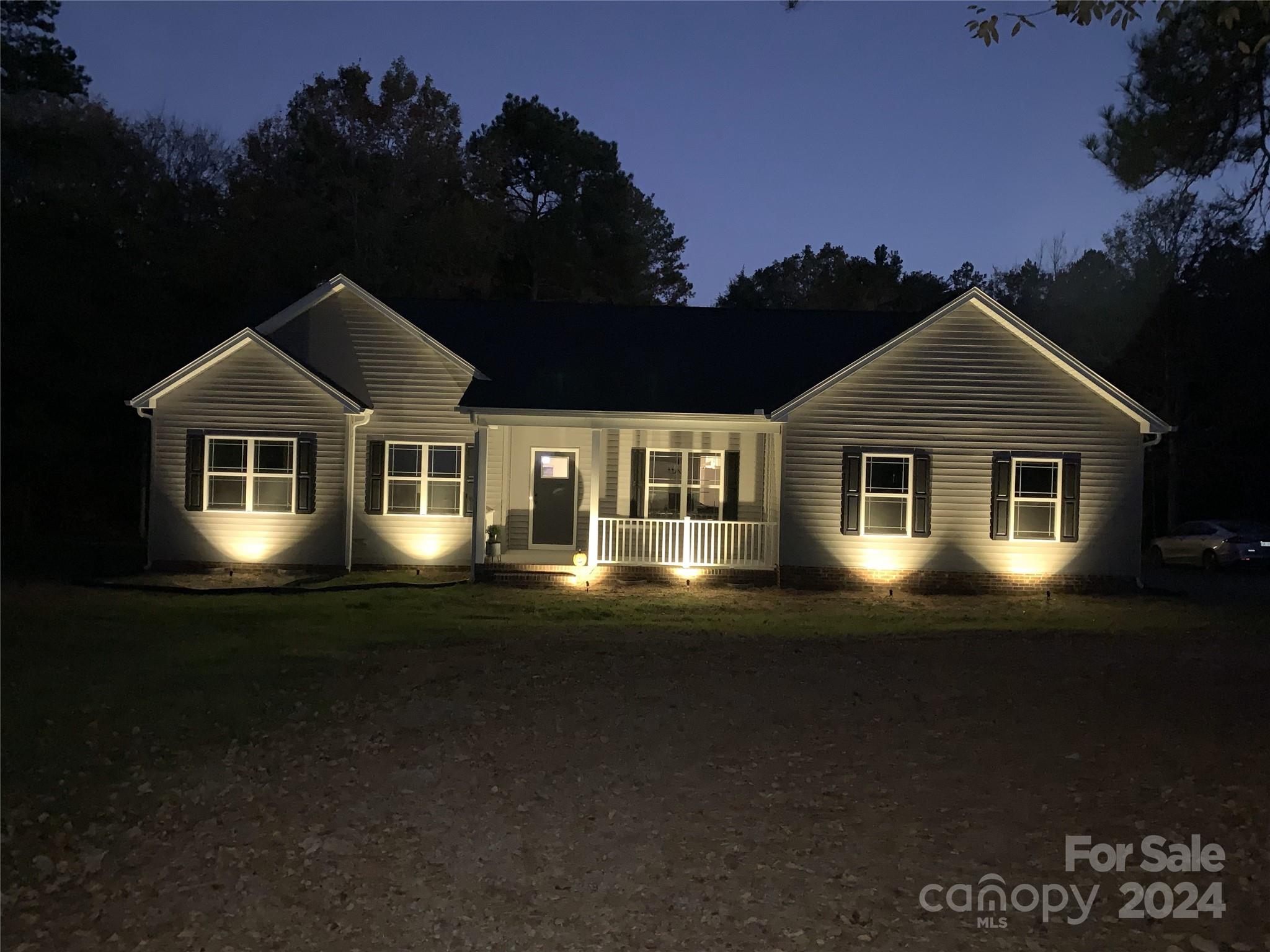 3000 Penninger Road Concord, NC 28025 - Photo 3 of 48 a front view of a house with a yard