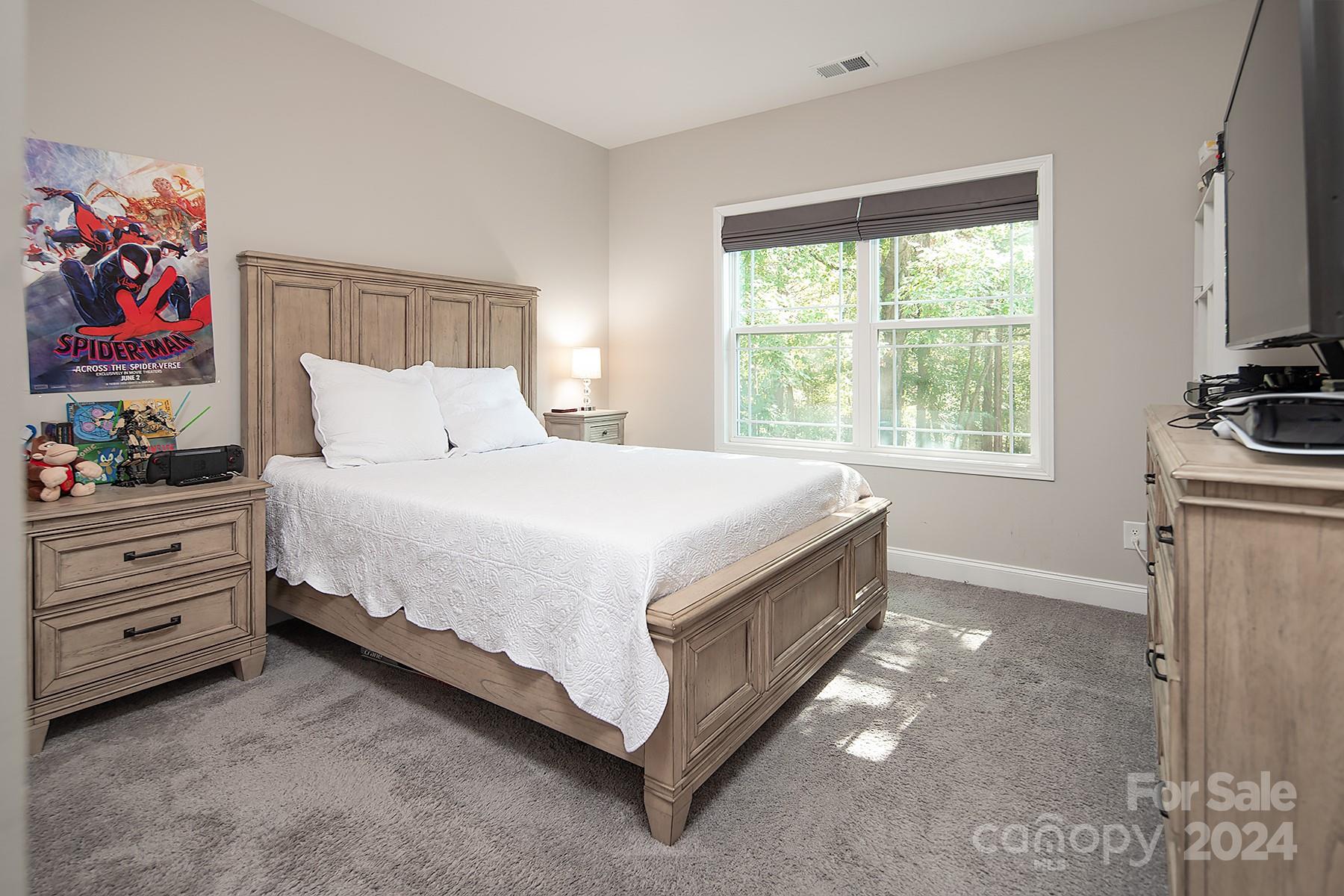 3000 Penninger Road Concord, NC 28025 - Photo 38 of 48 a spacious bedroom with a bed and a window