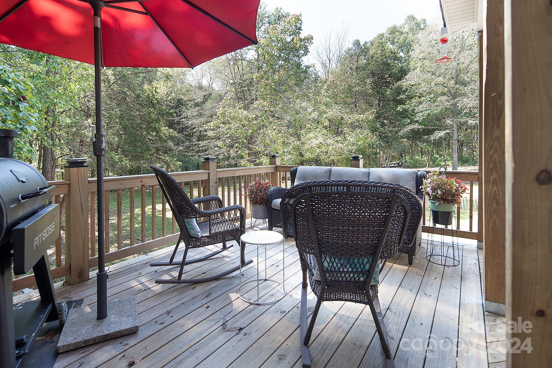 3000 Penninger Road Concord, NC 28025 - Photo 42 of 48 a view of balcony with furniture and wooden floor