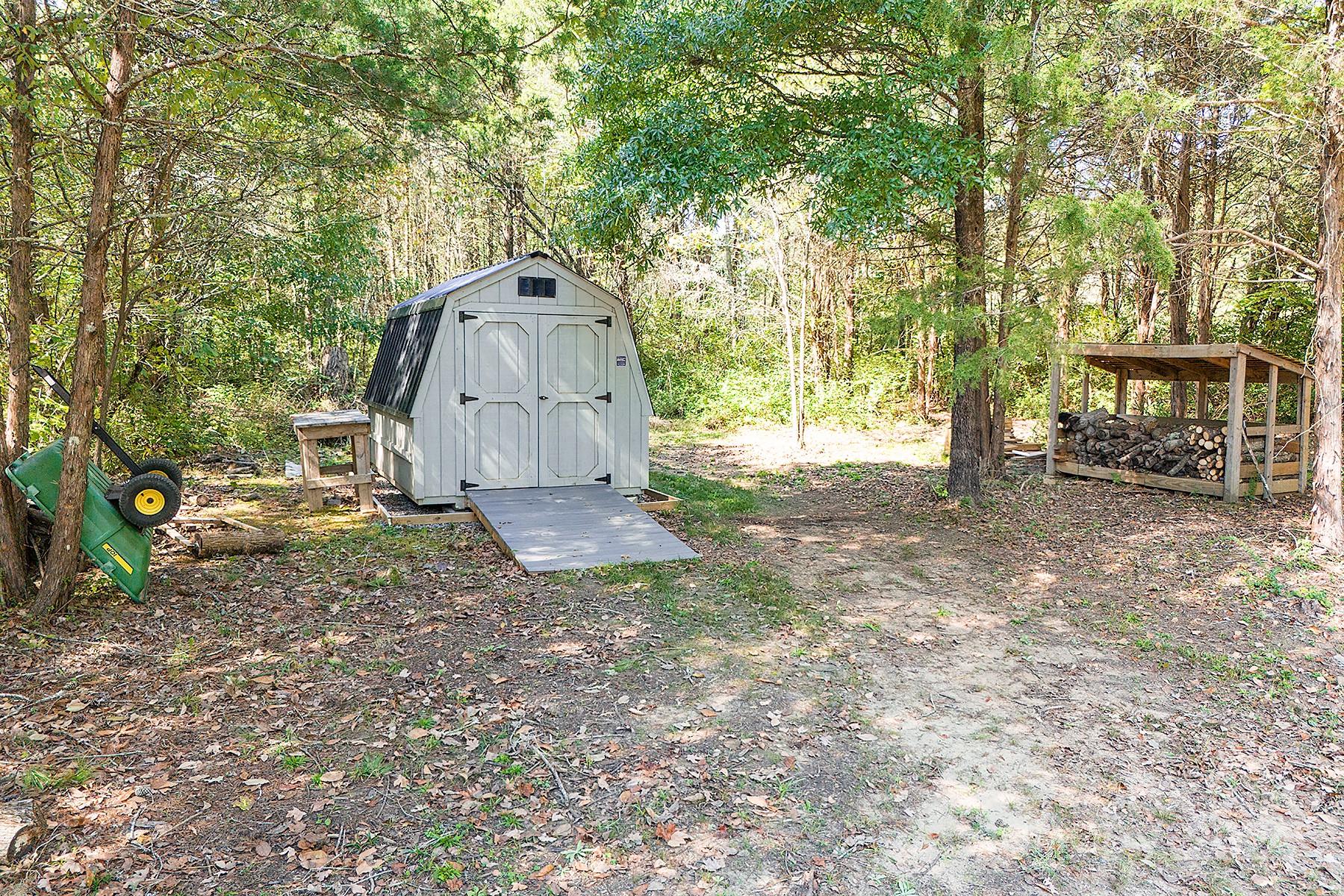 3000 Penninger Road Concord, NC 28025 - Photo 46 of 48 a backyard of a house with oven and garden