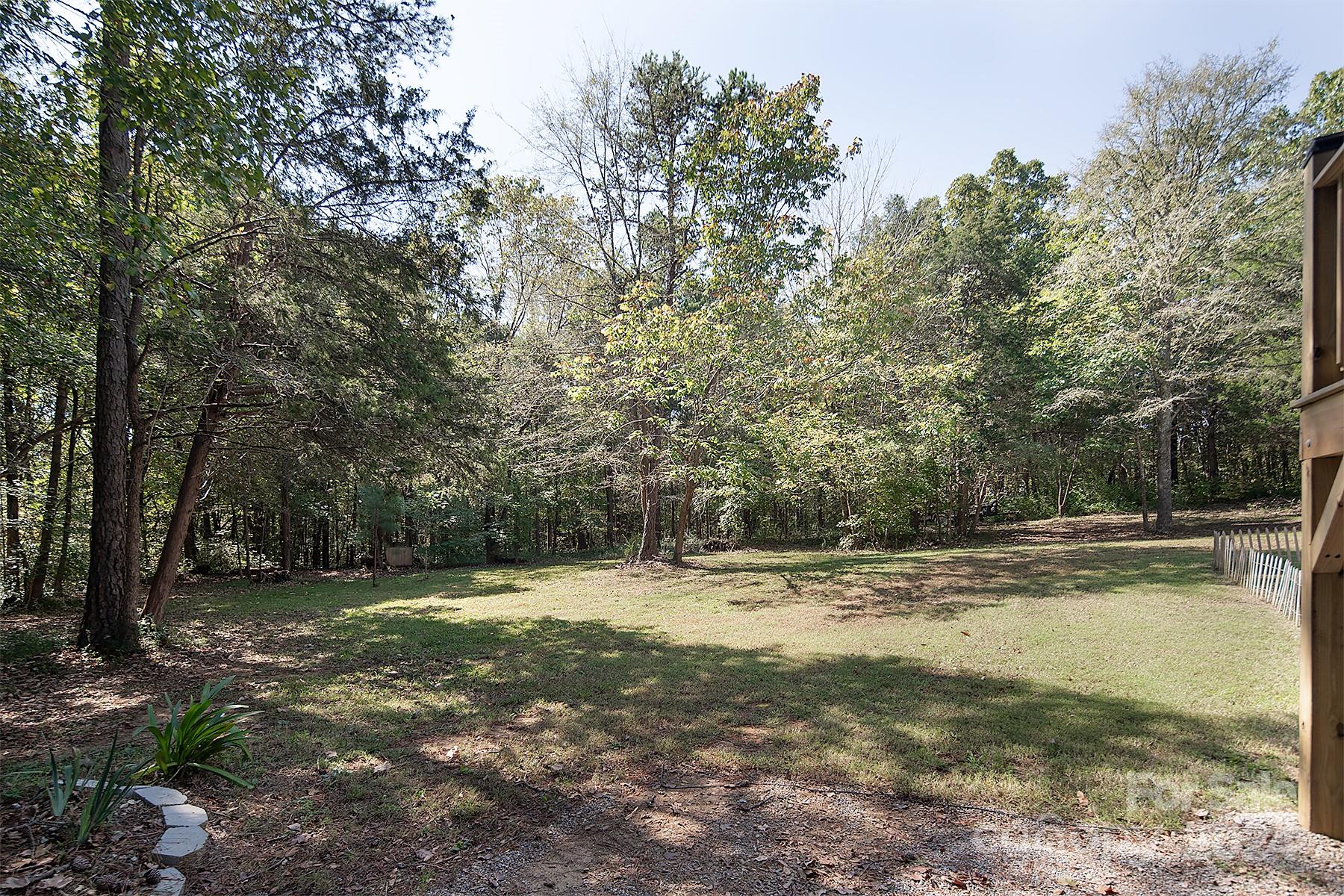 3000 Penninger Road Concord, NC 28025 - Photo 48 of 48 a view of a yard with large trees