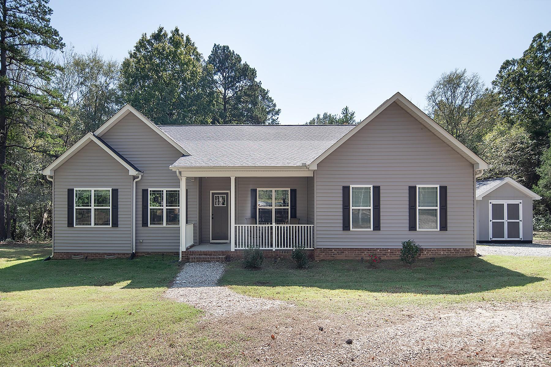 3000 Penninger Road Concord, NC 28025 - Photo 5 of 48 front view of a house with a yard