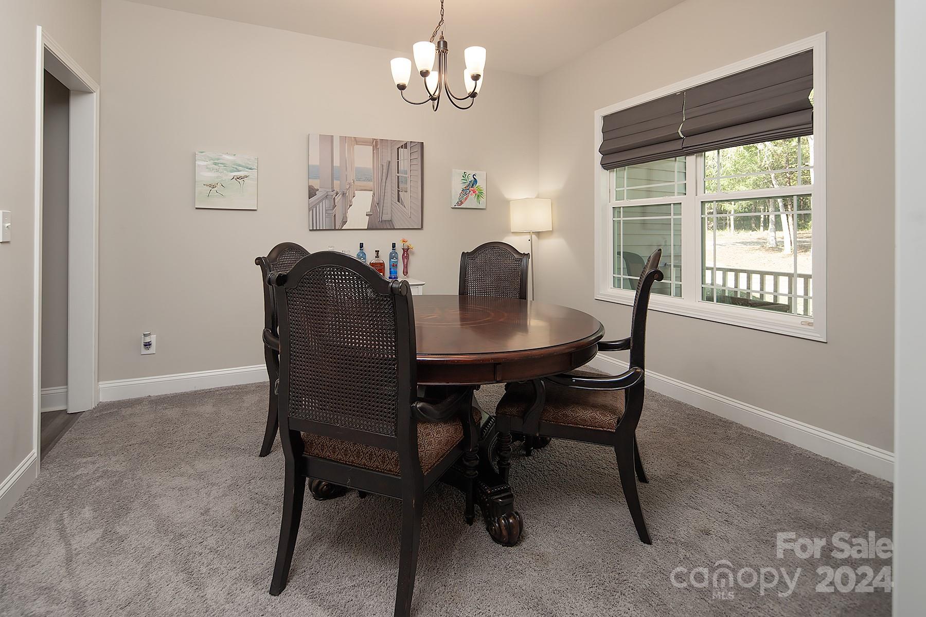3000 Penninger Road Concord, NC 28025 - Photo 10 of 48 a dining room with furniture and window