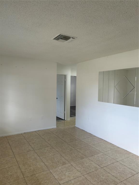 7808 Osteen Road New Port Richey, FL 34653 - Photo 4 of 20 a view of an empty room
