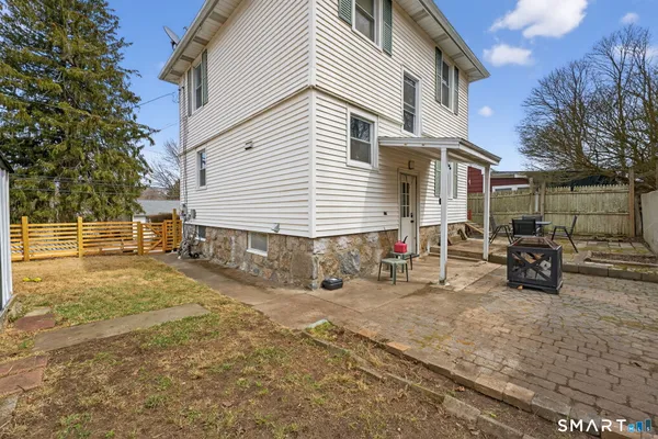 a view of a house with a patio