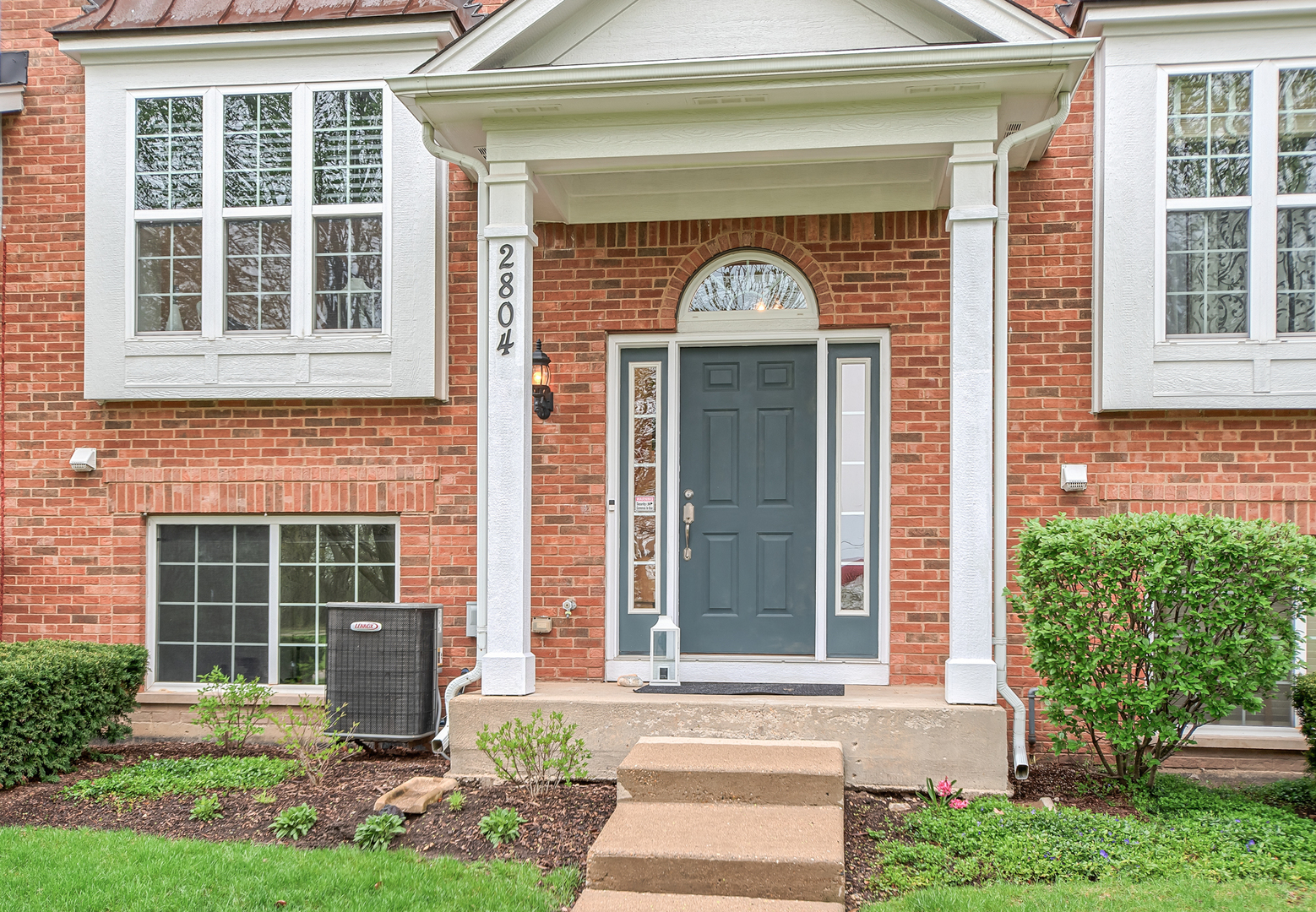 2804 Neubauer Circle Lindenhurst, IL 60046 - Photo 2 of 26 a front view of a house with a yard