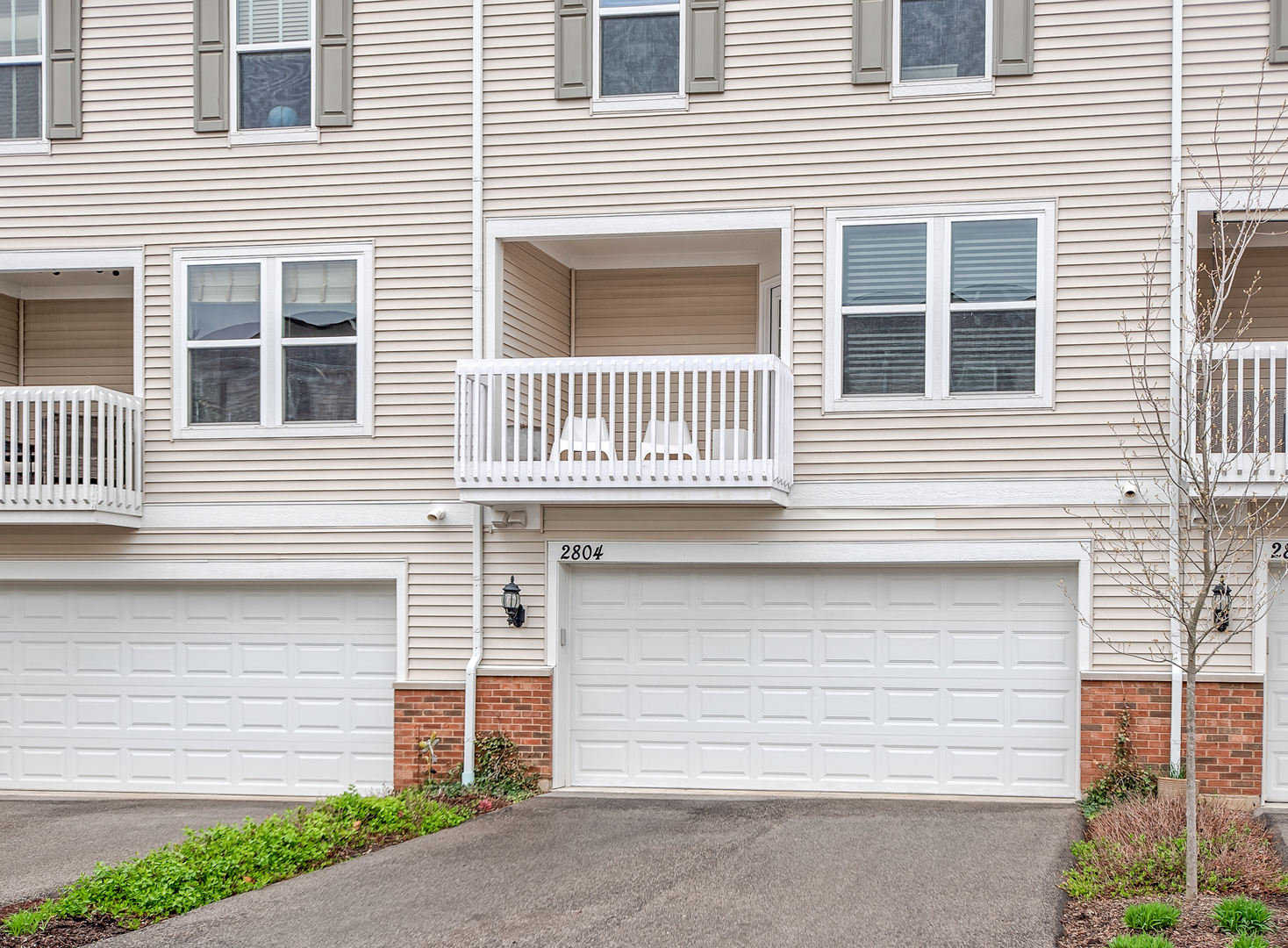 2804 Neubauer Circle Lindenhurst, IL 60046 - Photo 23 of 26 a view of a house with a yard and garage