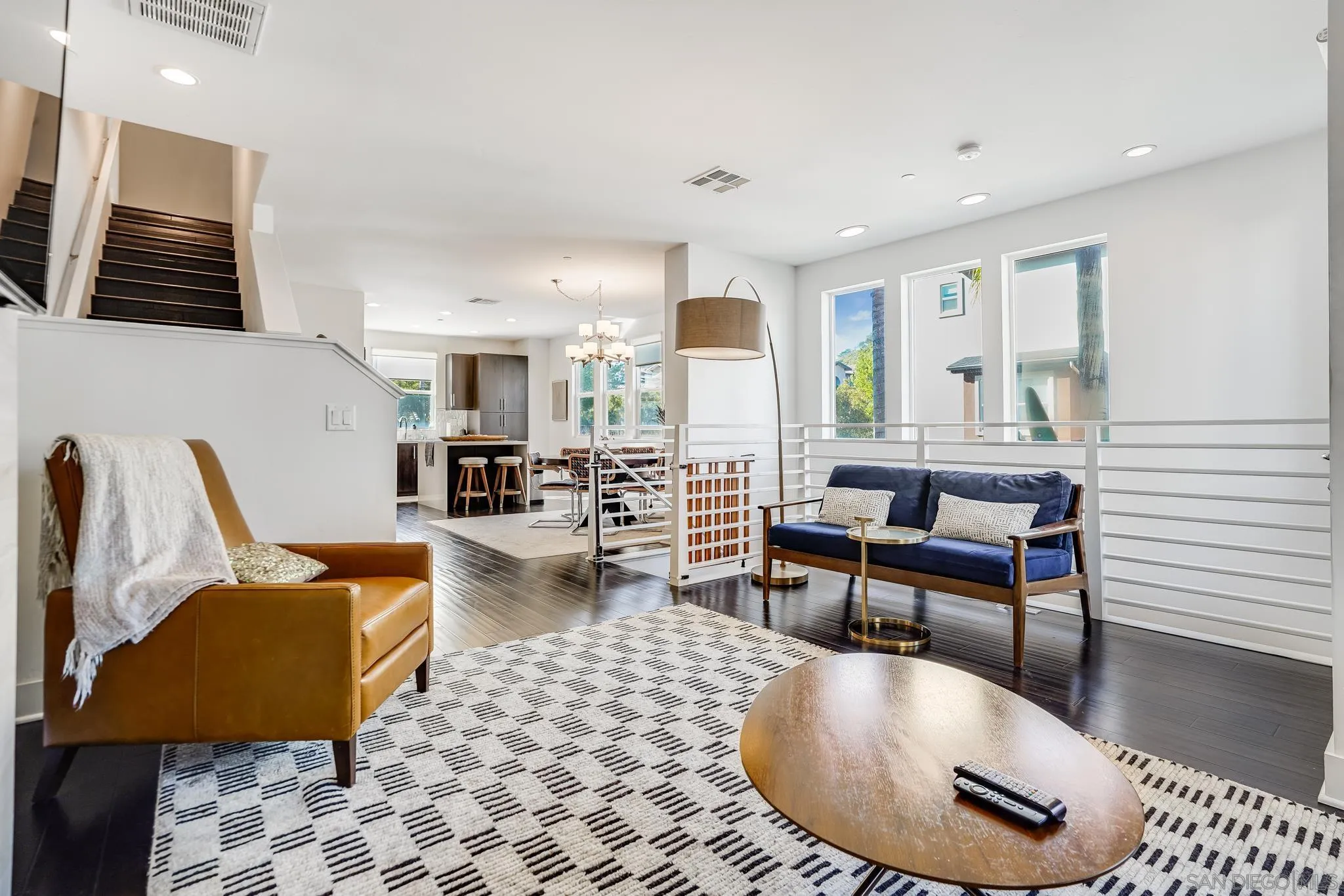 7803 Inception Way San Diego, CA 92108 - Photo 11 of 37 a living room with furniture and a flat screen tv