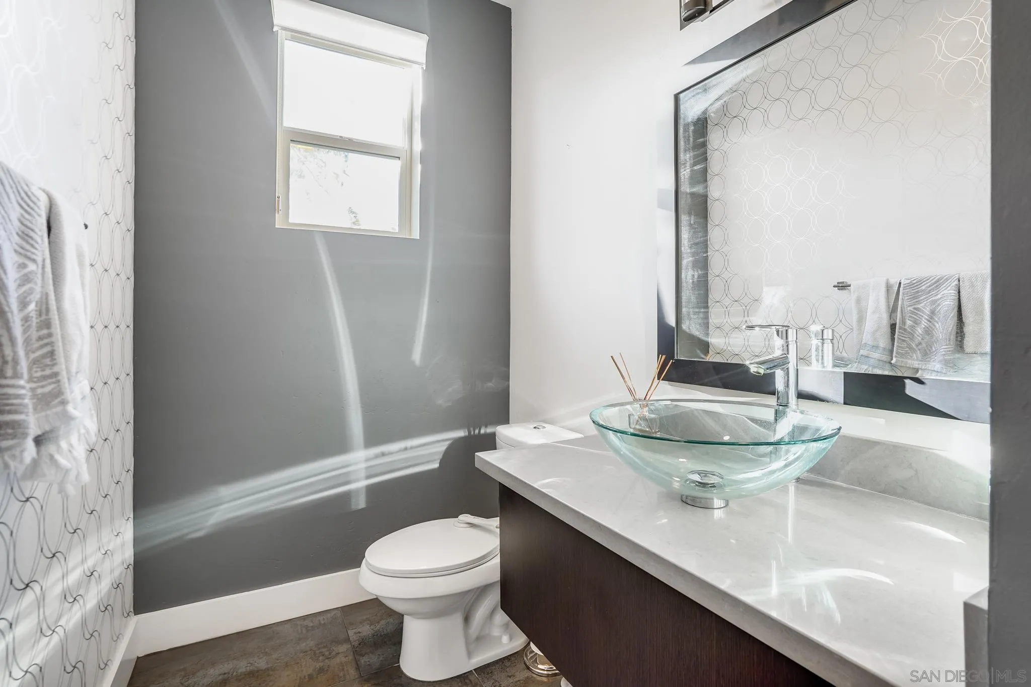 7803 Inception Way San Diego, CA 92108 - Photo 13 of 37 a bathroom with a sink and a toilet