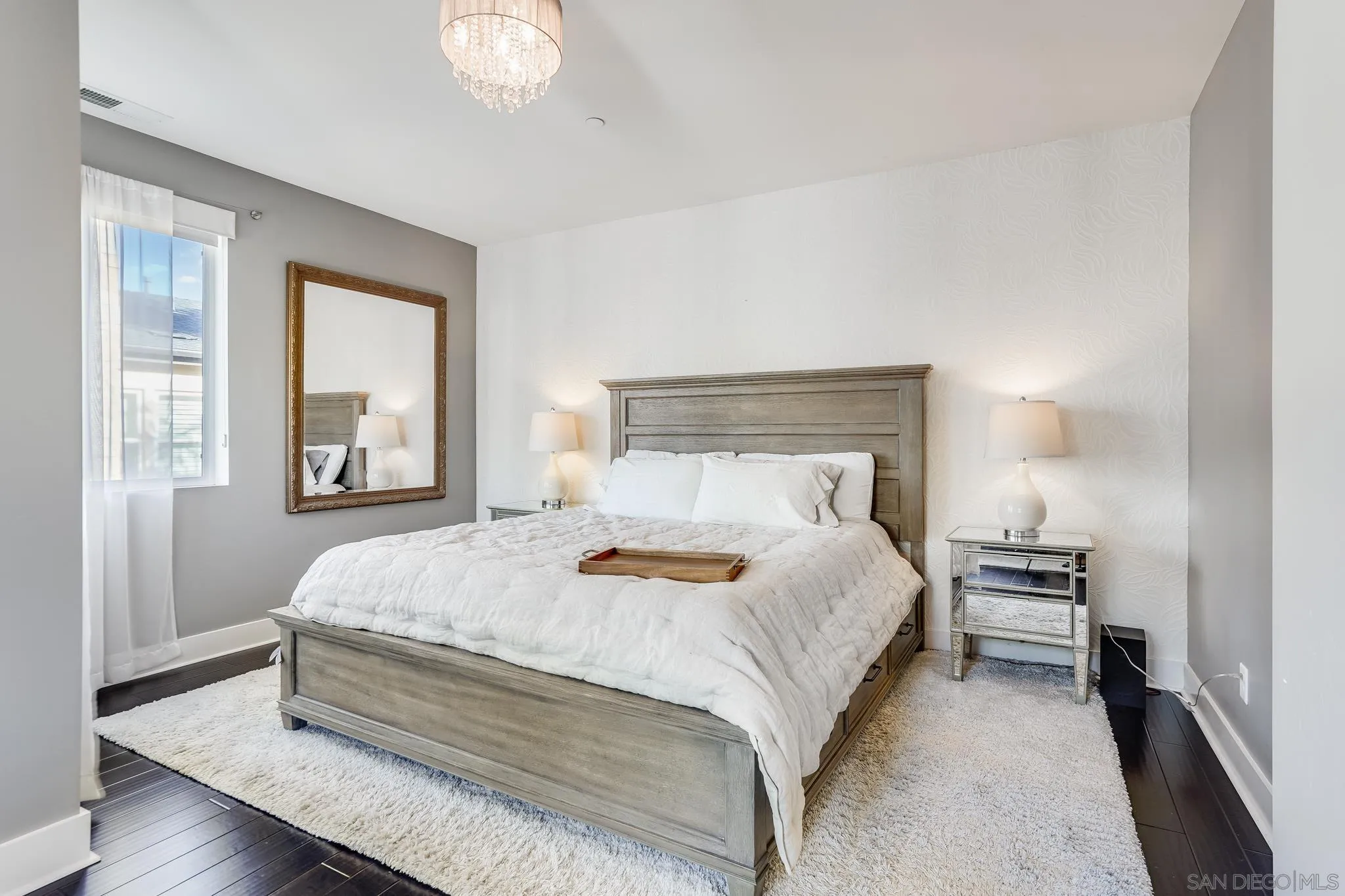 7803 Inception Way San Diego, CA 92108 - Photo 19 of 37 a bedroom with a bed and a window