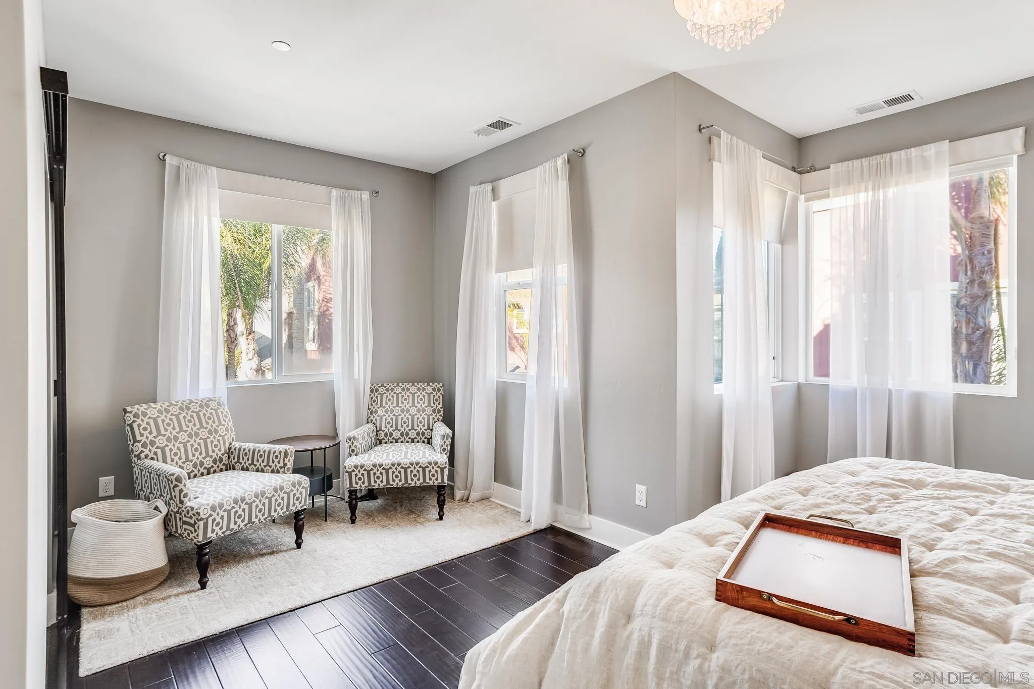 7803 Inception Way San Diego, CA 92108 - Photo 20 of 37 a bedroom with furniture and a large window