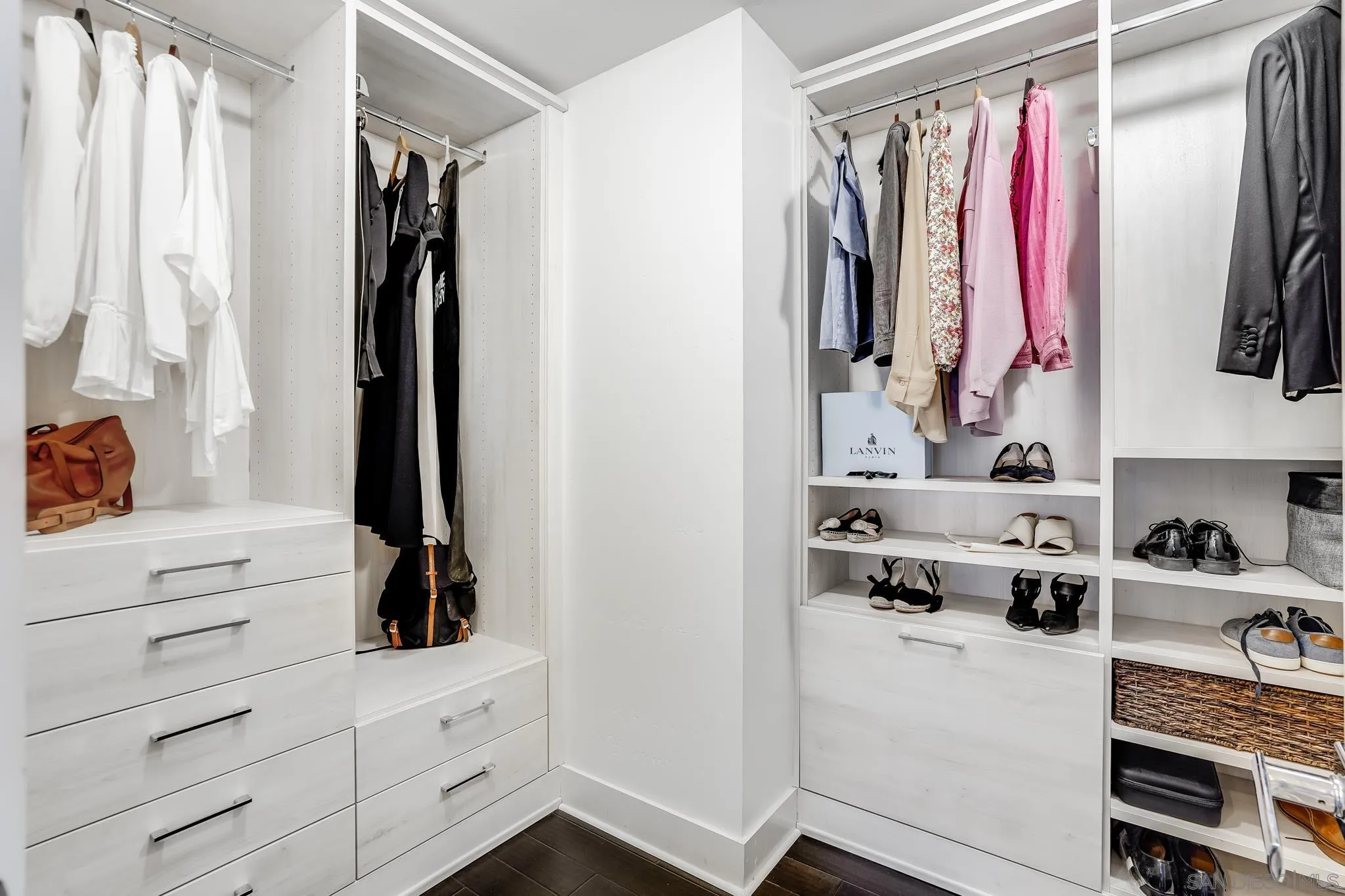 7803 Inception Way San Diego, CA 92108 - Photo 23 of 37 a view of walk in closet with clothes and shoes
