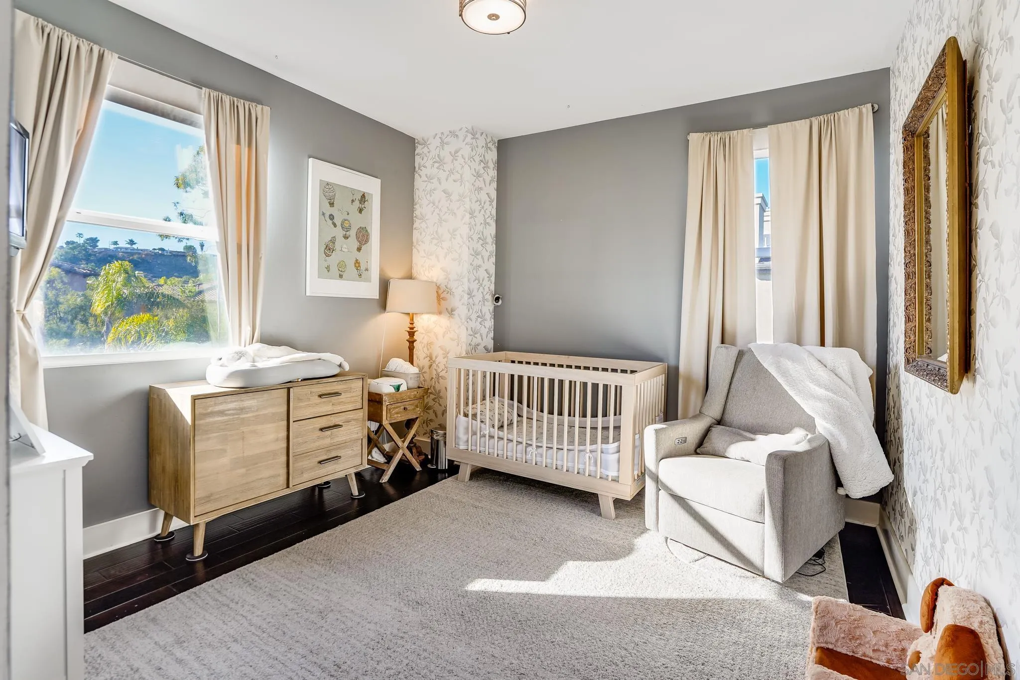 7803 Inception Way San Diego, CA 92108 - Photo 24 of 37 a bedroom with furniture and a window