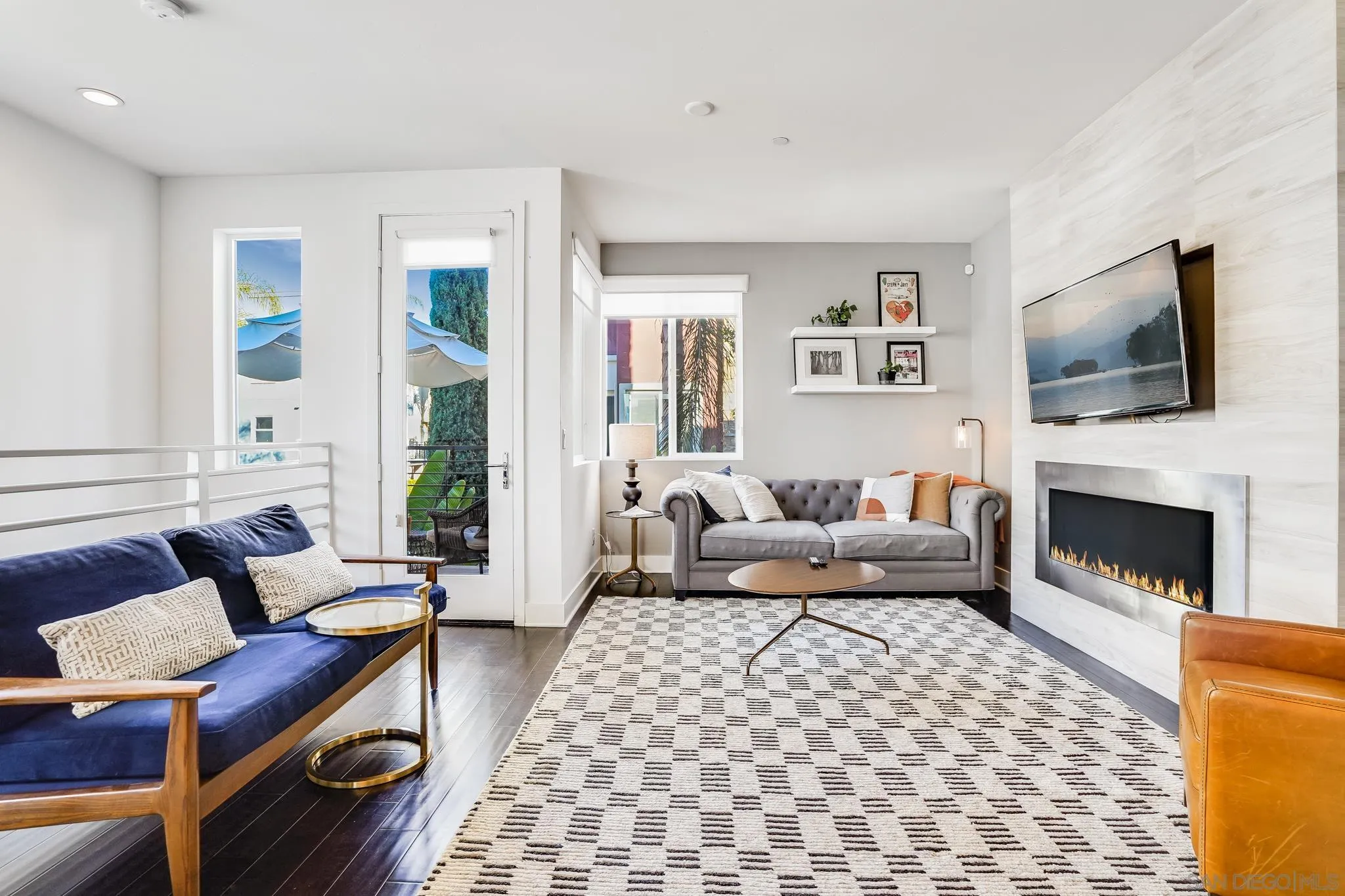 7803 Inception Way San Diego, CA 92108 - Photo 9 of 37 a living room with furniture fireplace and window