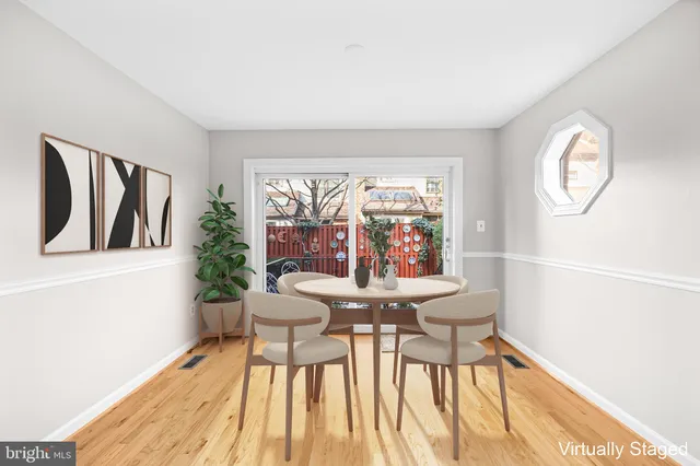 a bathroom with a toilet and a bathtub
