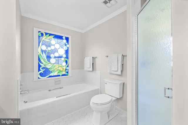 a view of backyard with a garden and trees