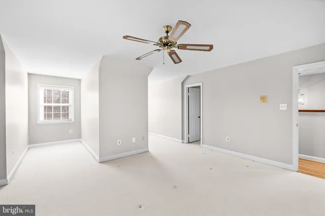 a patio with table and chairs