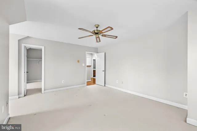 a view of a backyard with sitting area