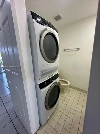 a bathroom with a toilet and a sink