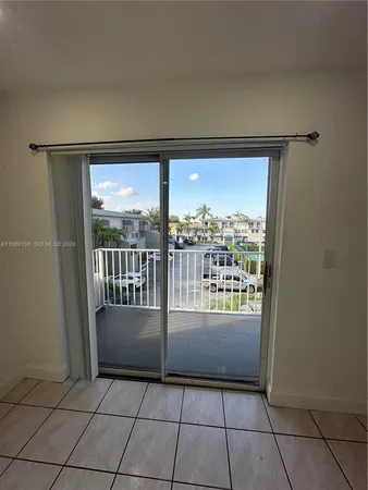 a view of a room with a large window