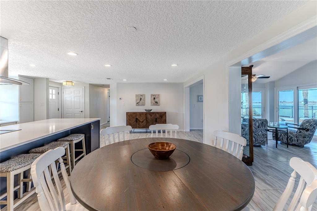 3409 Gulf Winds Circle Hernando Beach, FL 34607 - Photo 13 of 84 a living room with furniture and a wooden floor