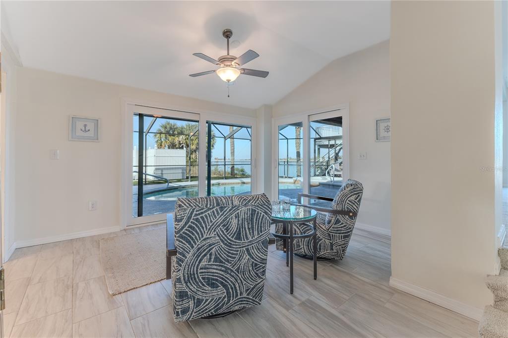 3409 Gulf Winds Circle Hernando Beach, FL 34607 - Photo 26 of 84 a living room with furniture and a large window