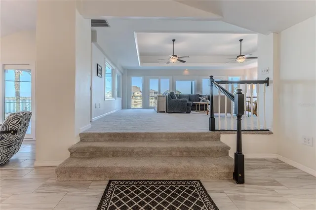 an aerial view of a house with a ocean view