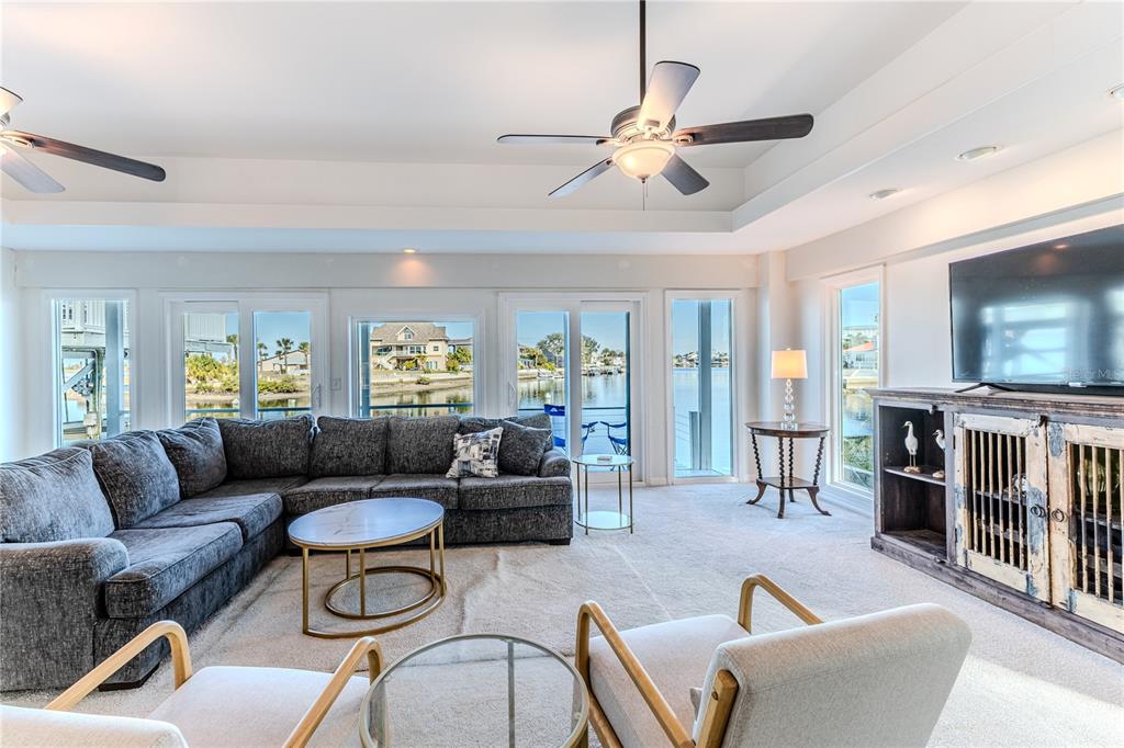 3409 Gulf Winds Circle Hernando Beach, FL 34607 - Photo 31 of 84 a living room with furniture and a flat screen tv