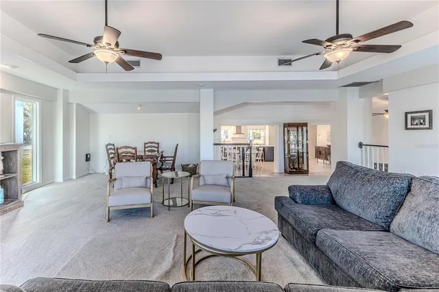an aerial view of a house with a ocean view